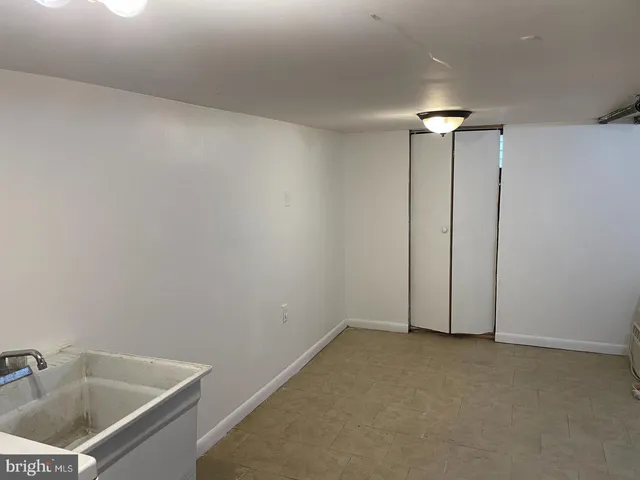 a bathroom with a sink and tub