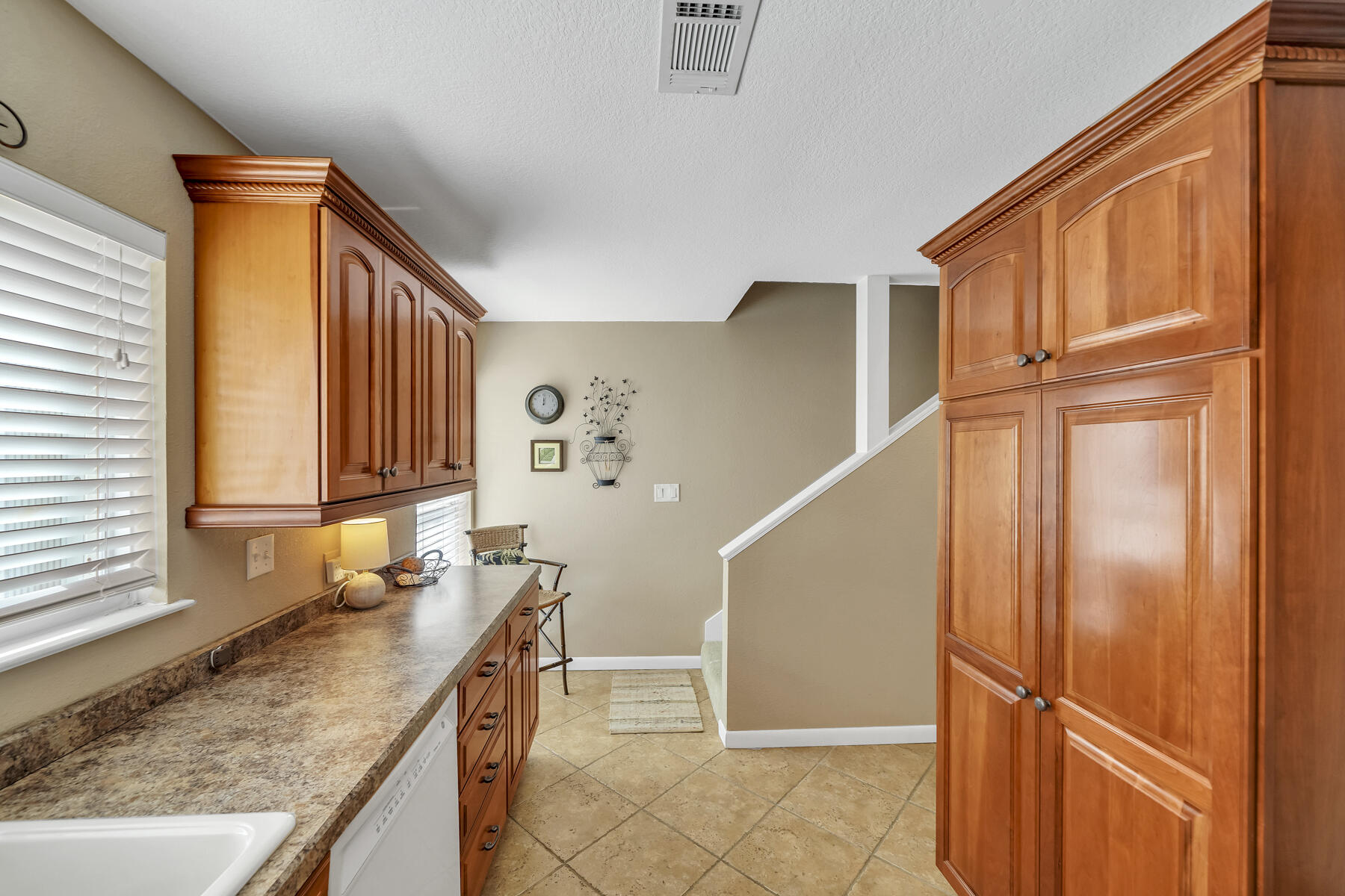 173 Durango Road Destin, FL 32541 - Photo 23 of 37 a kitchen with granite countertop a sink and a refrigerator