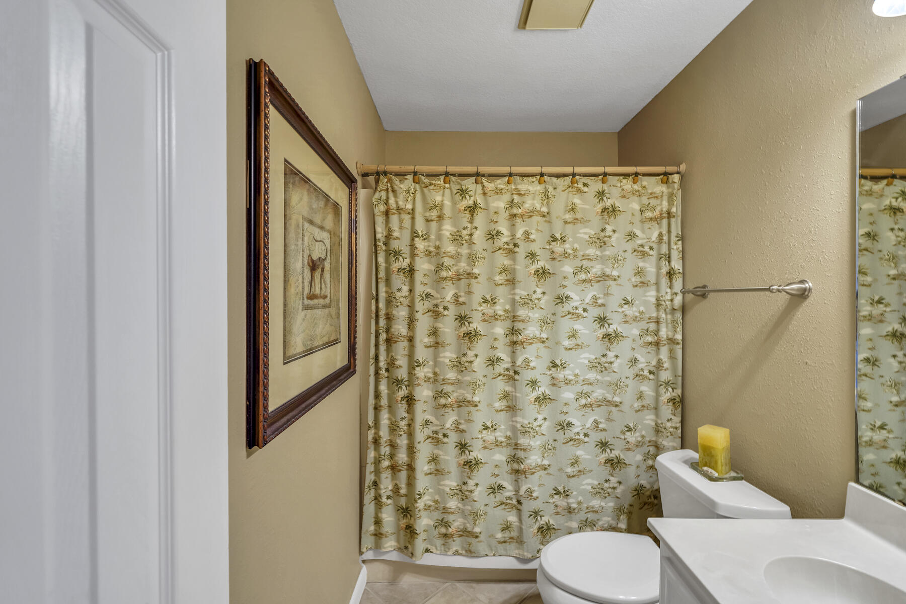 173 Durango Road Destin, FL 32541 - Photo 25 of 37 a bathroom with a toilet and shower curtain