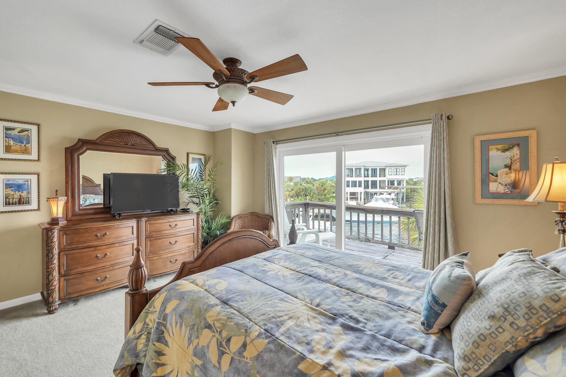 173 Durango Road Destin, FL 32541 - Photo 29 of 37 a bedroom with a large bed and a large window