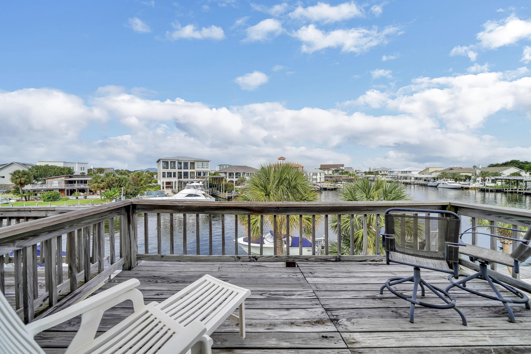 173 Durango Road Destin, FL 32541 - Photo 35 of 37 a view of roof deck with lounge chair and wooden floor