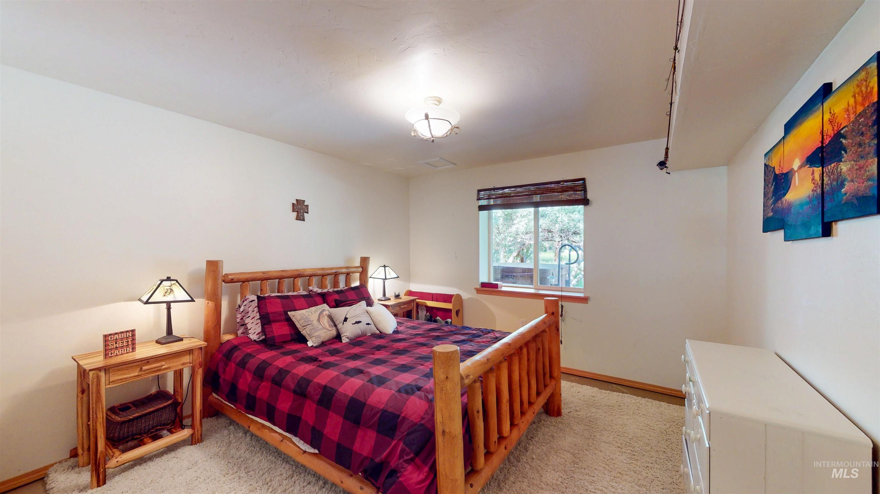 1314 River Road Buhl, ID 83316 - Photo 30 of 45 Bedroom featuring light carpet and baseboards