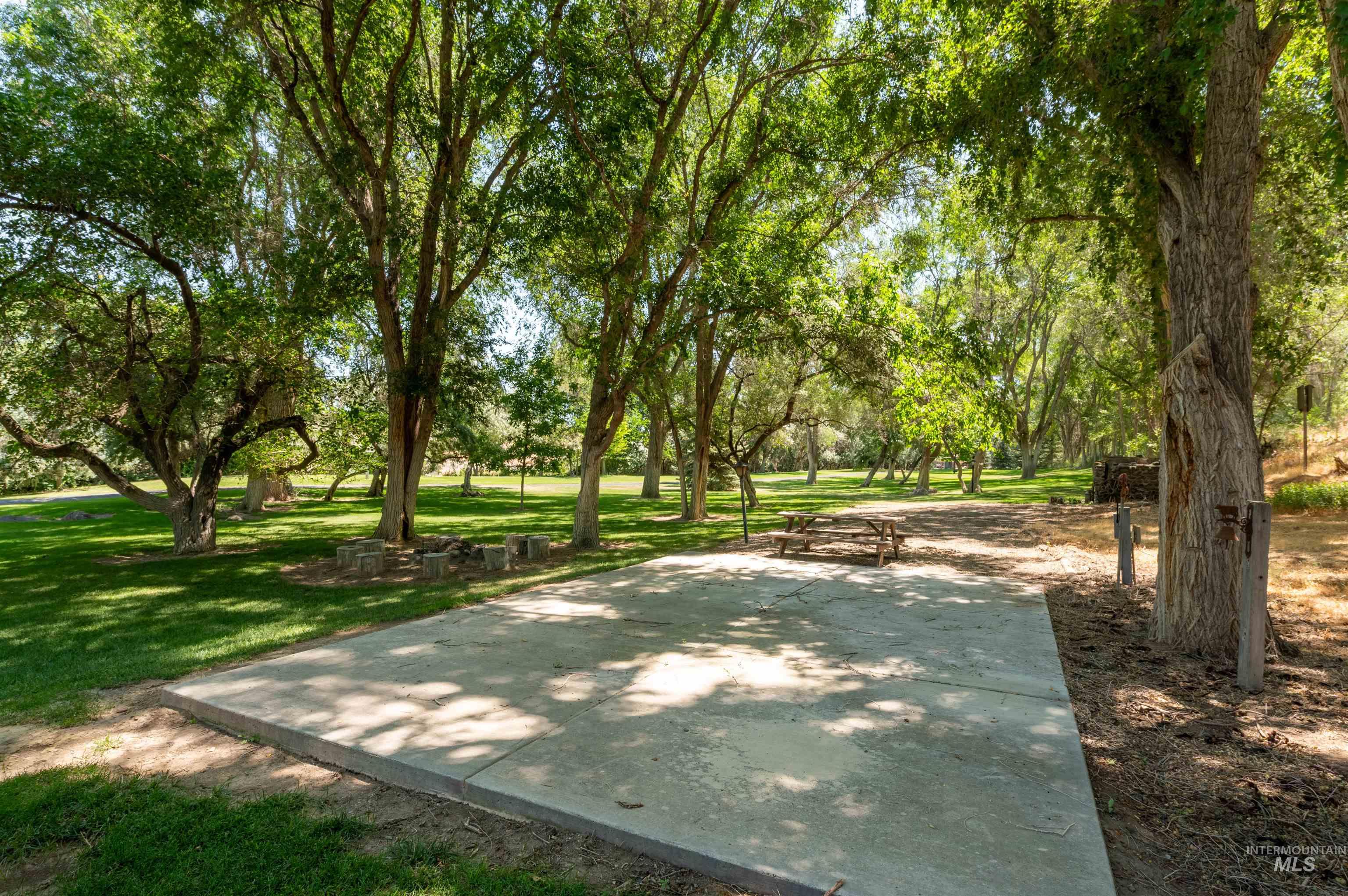 1314 River Road Buhl, ID 83316 - Photo 36 of 45 View of community with a yard and view of wooded area