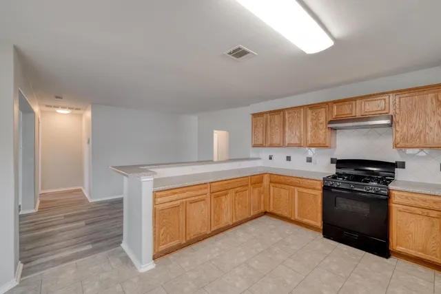 a bathroom with a sink vanity and a mirror