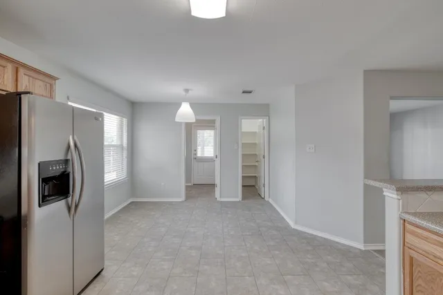 a white bath tub sitting next to a window