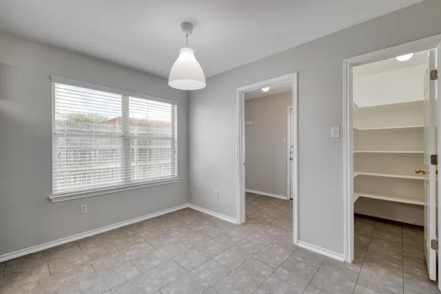 a view of a room with racks on the wall