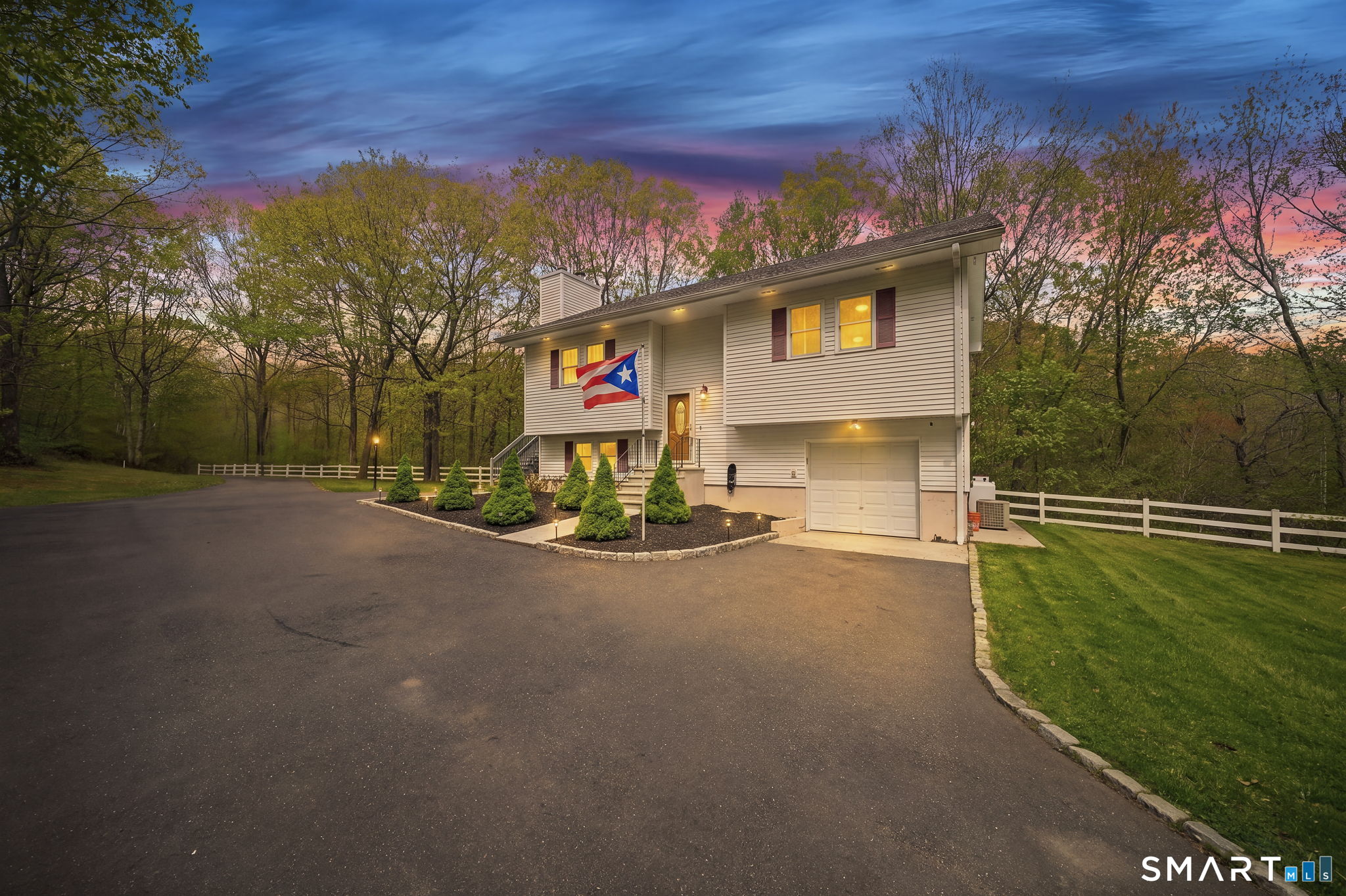 1118 Spindle Hill Road Wolcott, CT 06716 - Photo 5 of 38 a view of a street with a building in the background