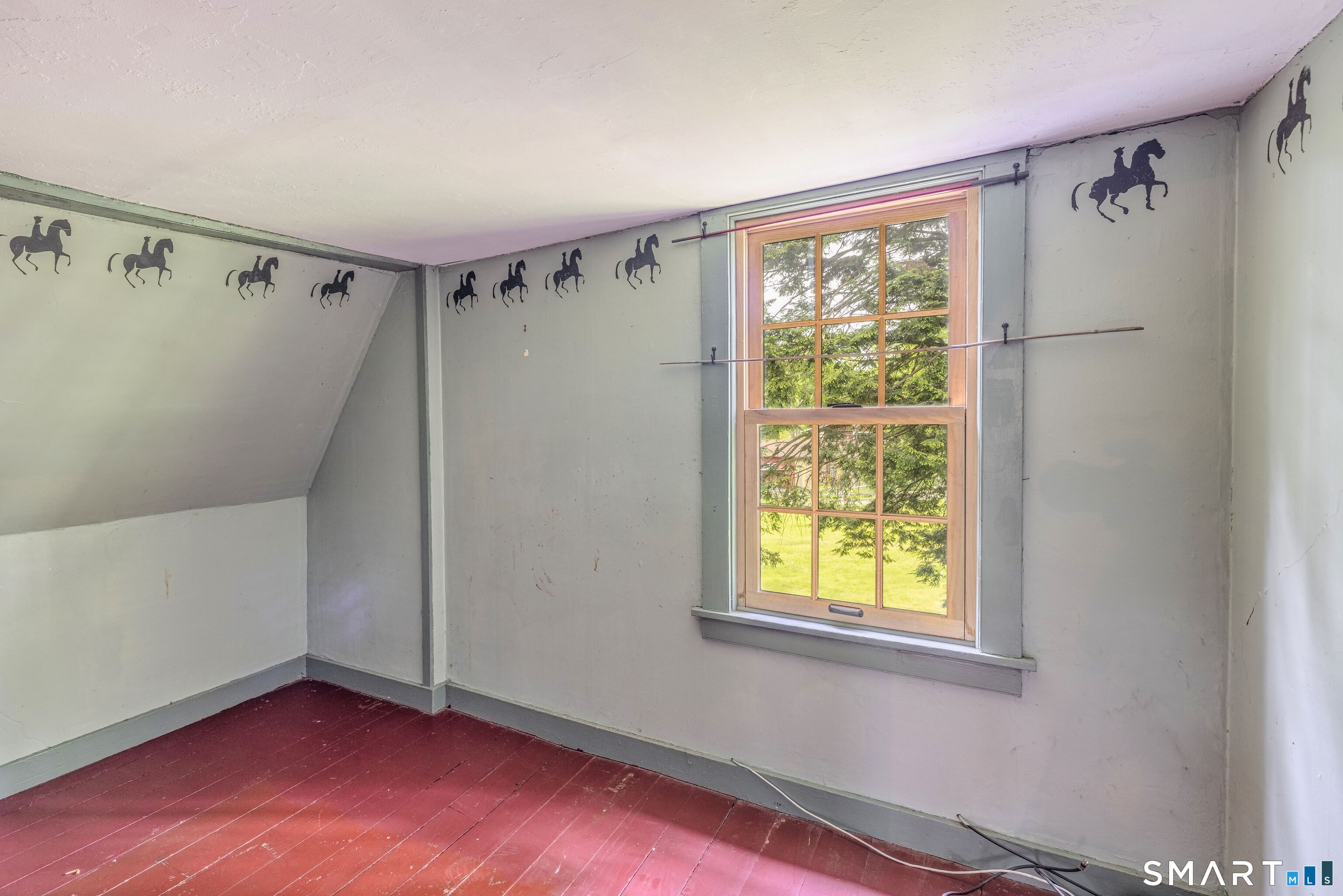 261 Hebron Road Bolton, CT 06043 - Photo 26 of 40 a view of hallway with window and a wooden floor