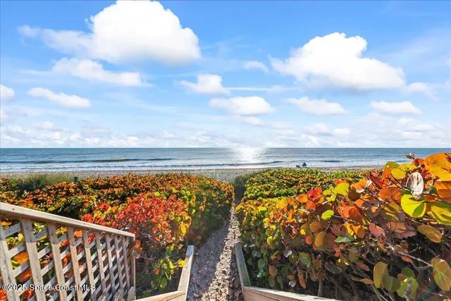 a view of an ocean from a balcony