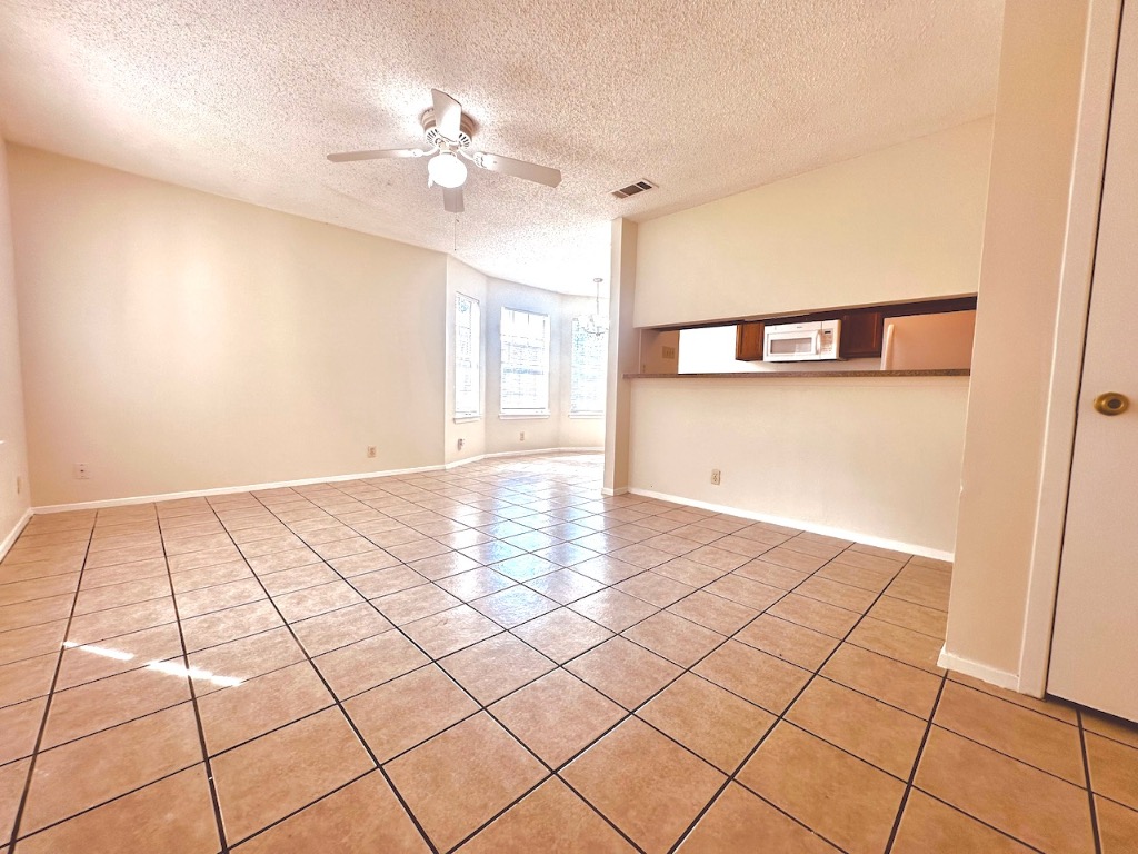 2004 Kirksey Drive, Unit D Austin, TX 78741 - Photo 2 of 20 a view of an empty room and window