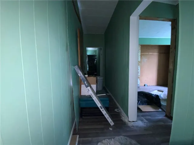 a view of entryway with a front door