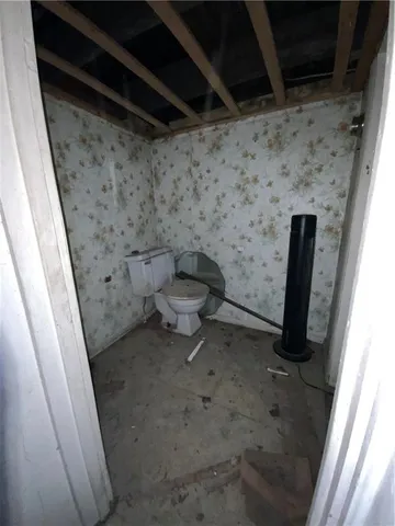 a room with furniture and a mirror