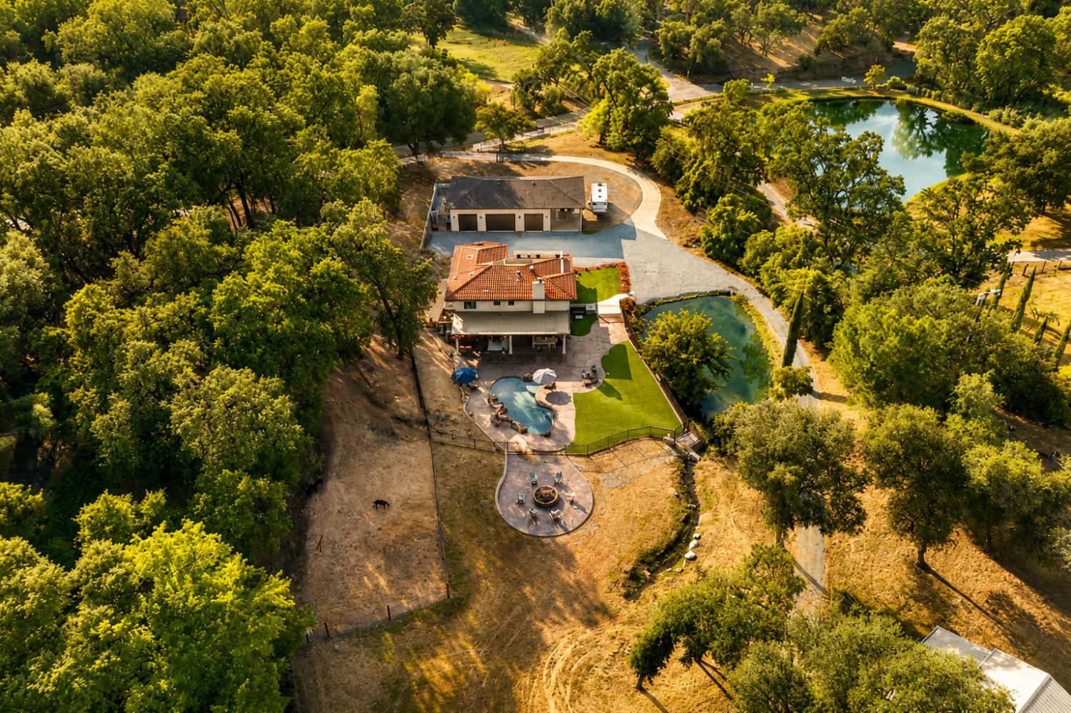 3340 Garden Bar Road Lincoln, CA 95648 - Photo 45 of 56 an aerial view of a house with a yard swimming pool and outdoor seating