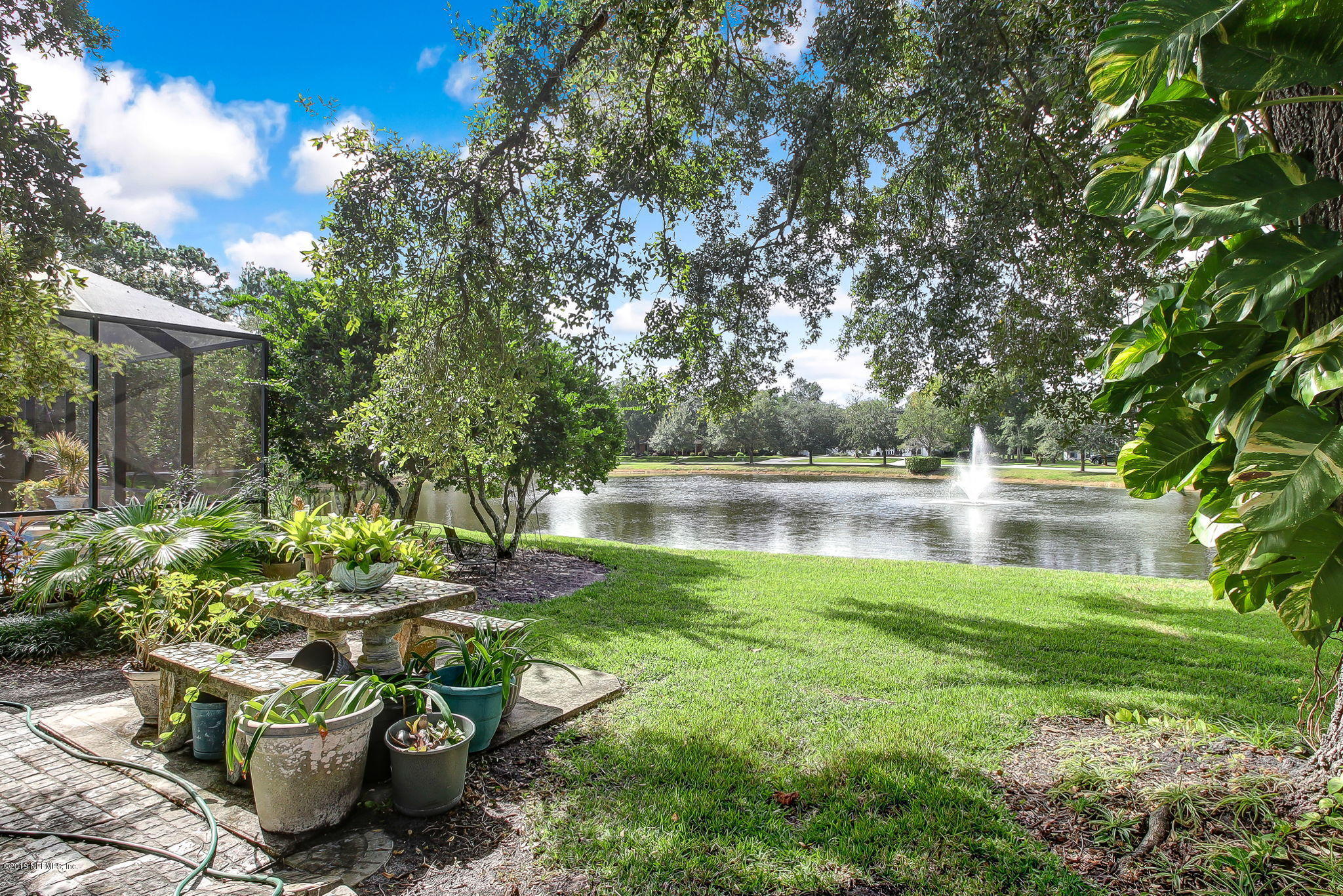 8487 Hollyridge Road Jacksonville, FL 32256 - Photo 57 of 88 Backyard View of Water & Fountain