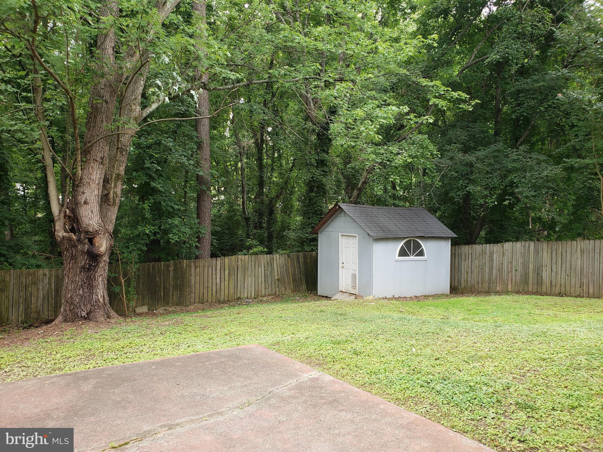 13350 Kerrydale Road Woodbridge, VA 22193 - Photo 10 of 10 a house with a yard
