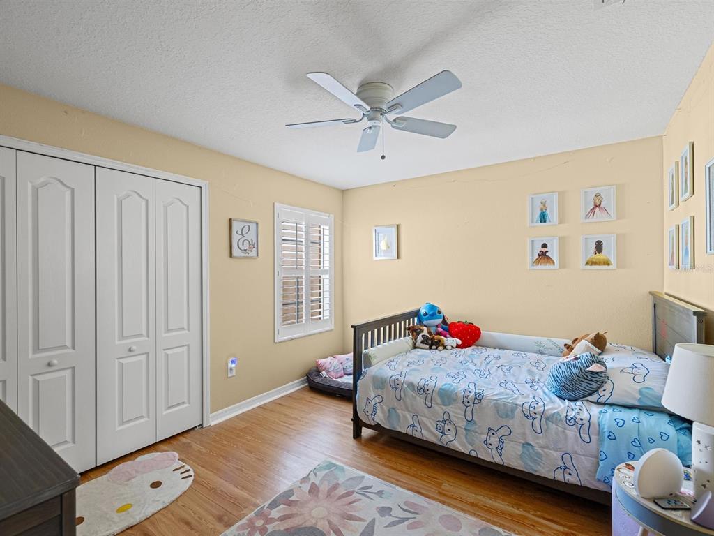 9588 Trumpet Vine Loop Trinity, FL 34655 - Photo 28 of 49 a living room with furniture and a window
