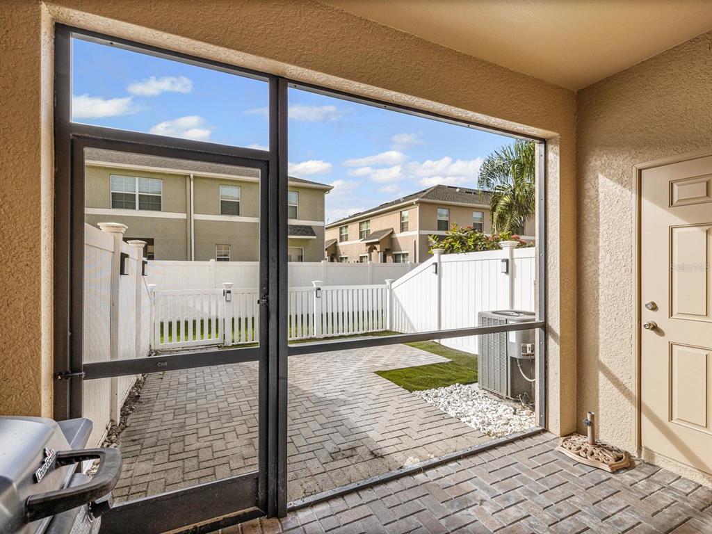 9588 Trumpet Vine Loop Trinity, FL 34655 - Photo 32 of 49 a view of a living room and a balcony