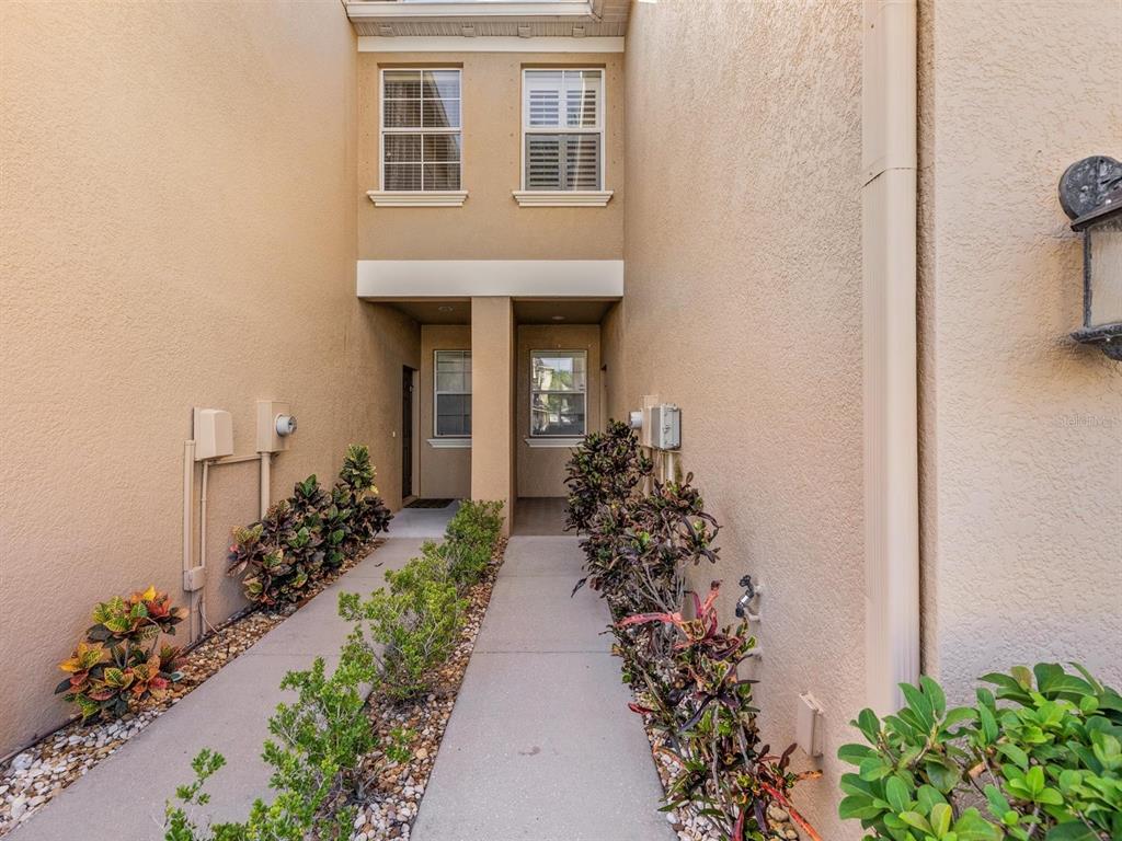 9588 Trumpet Vine Loop Trinity, FL 34655 - Photo 39 of 49 a front view of a house with a yard