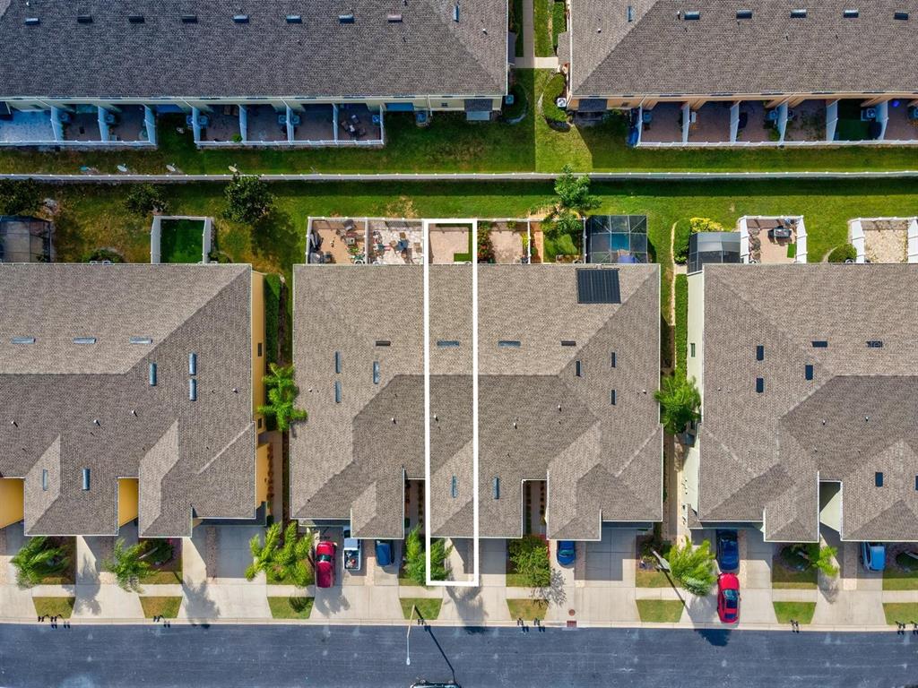 9588 Trumpet Vine Loop Trinity, FL 34655 - Photo 45 of 49 an aerial view of house with outdoor space and parking