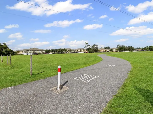 a view of a park with a houses