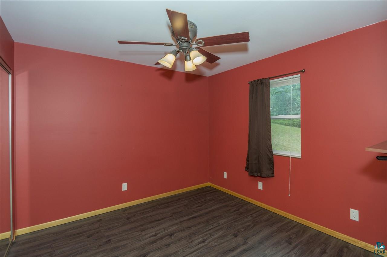 6190 East Lyman Lake Road South Range, WI 54874 - Photo 17 of 25 Closet with light, 100 amp circuit breaker, electric baseboard heat, ceiling fan w/ light, window