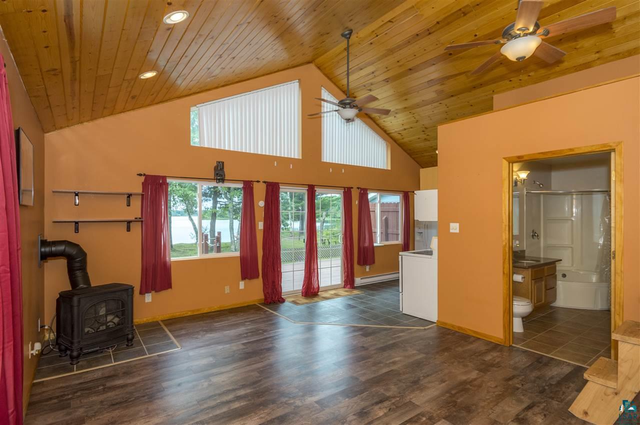 6190 East Lyman Lake Road South Range, WI 54874 - Photo 8 of 25 Gas fireplace, Recessed lighting, Ceiling fans, Front entry tiling, Natural lighting