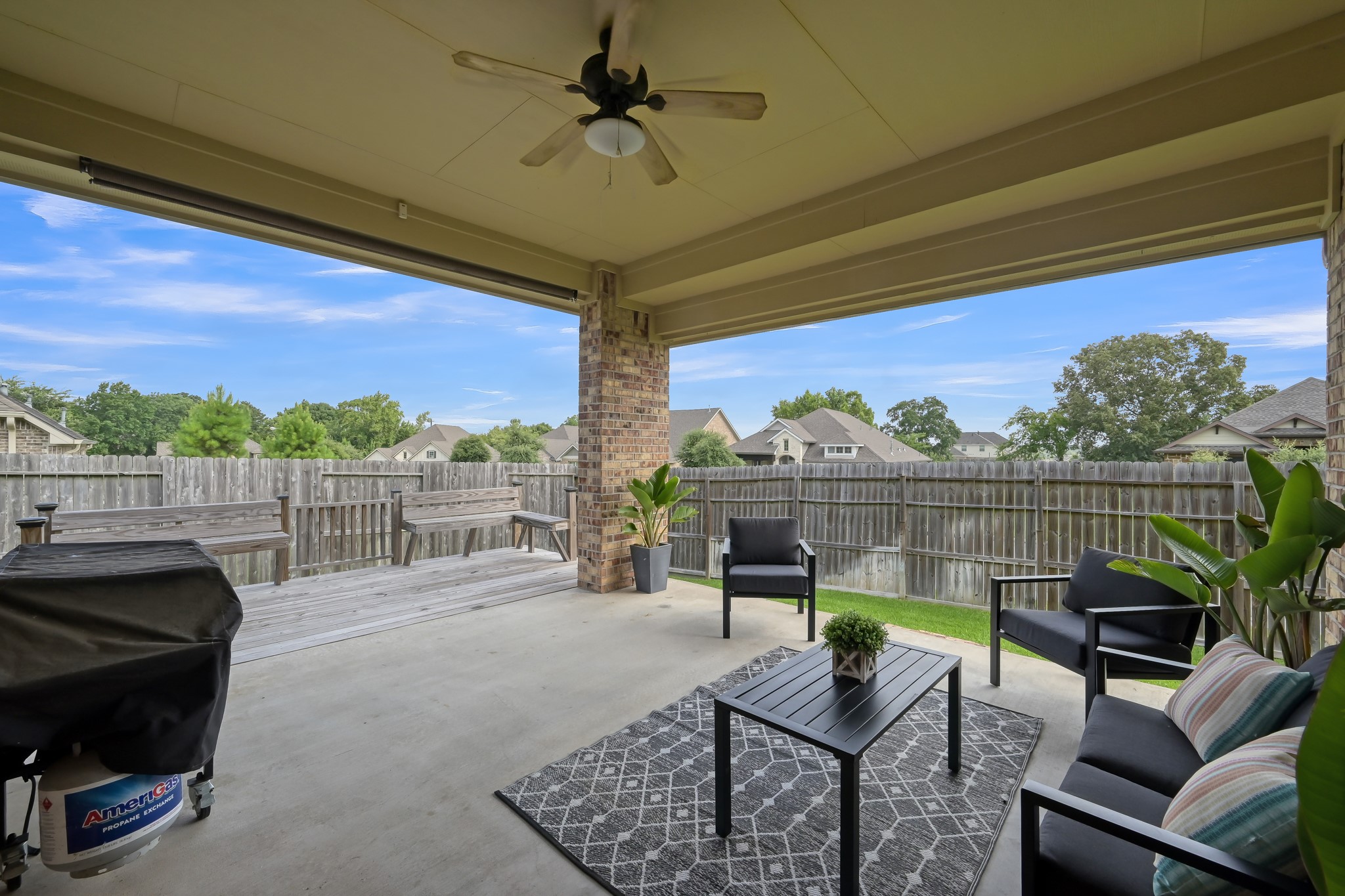 121 Dudley Road Montgomery, TX 77356 - Photo 32 of 36 Covered patio with sun screen to filter late day sun