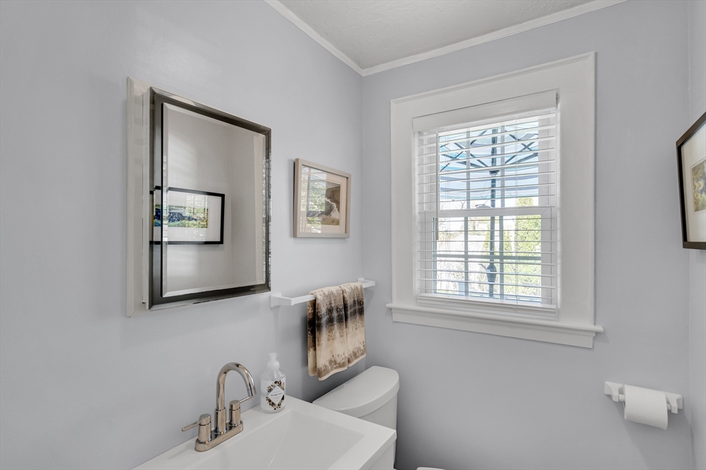90 Governors Road Milton, MA 02186 - Photo 12 of 28 a bathroom with 2 sink and a mirror