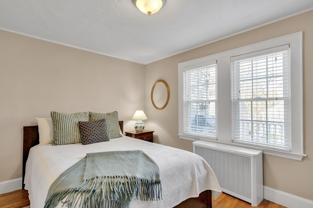 90 Governors Road Milton, MA 02186 - Photo 17 of 28 a bedroom with a bed and a window
