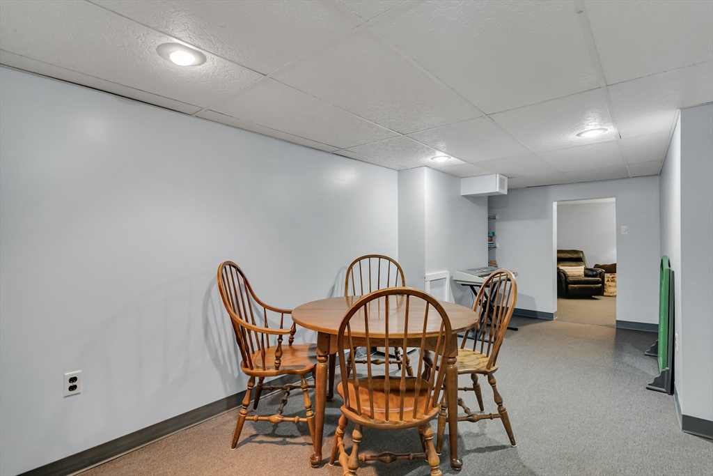 90 Governors Road Milton, MA 02186 - Photo 20 of 28 a view of a dining room with furniture