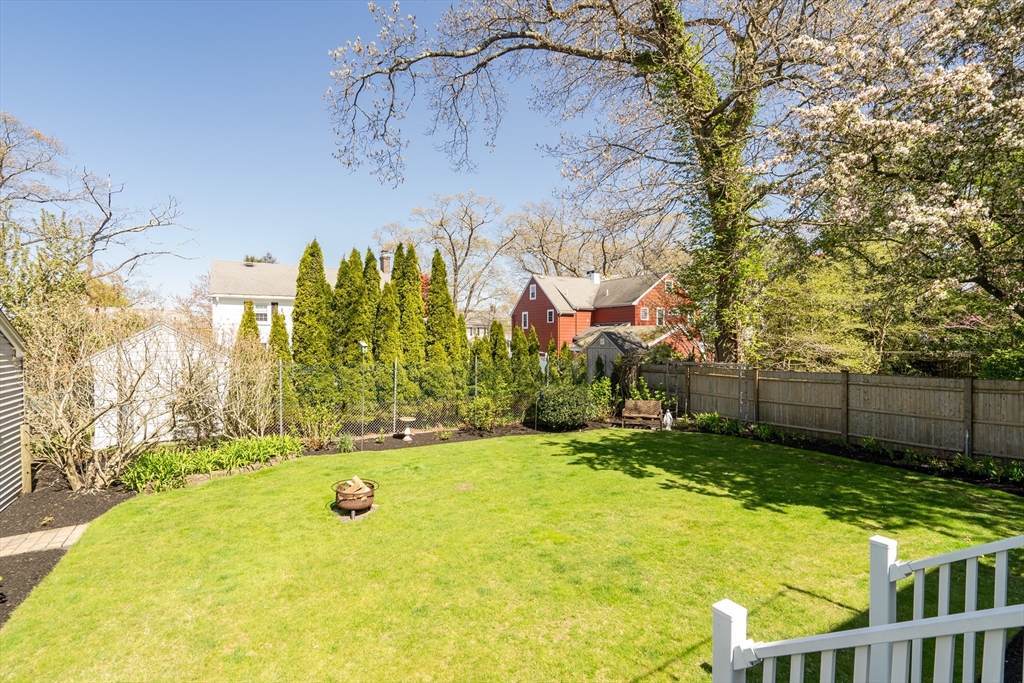 90 Governors Road Milton, MA 02186 - Photo 22 of 28 a view of a yard with swimming pool