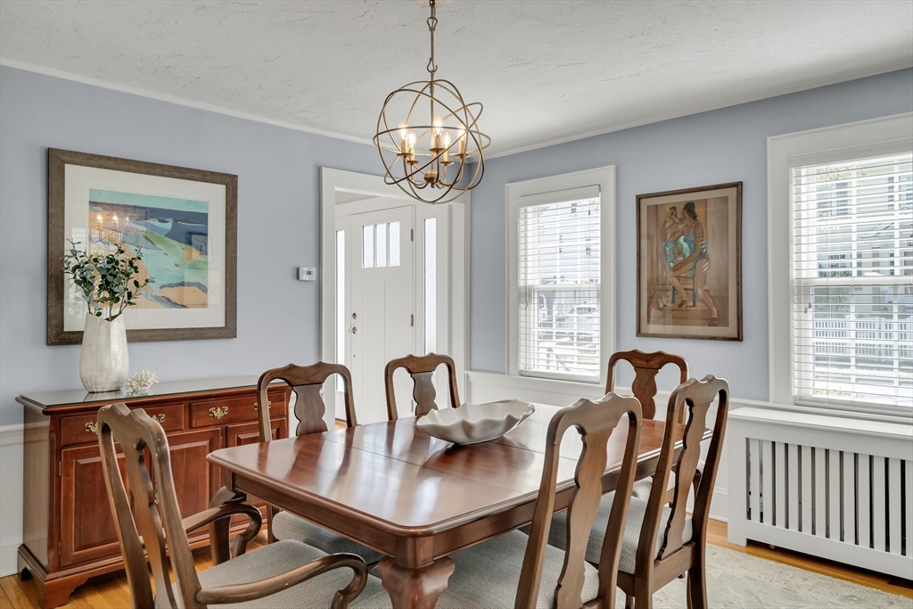 90 Governors Road Milton, MA 02186 - Photo 9 of 28 a view of a dining room with furniture window and outside view