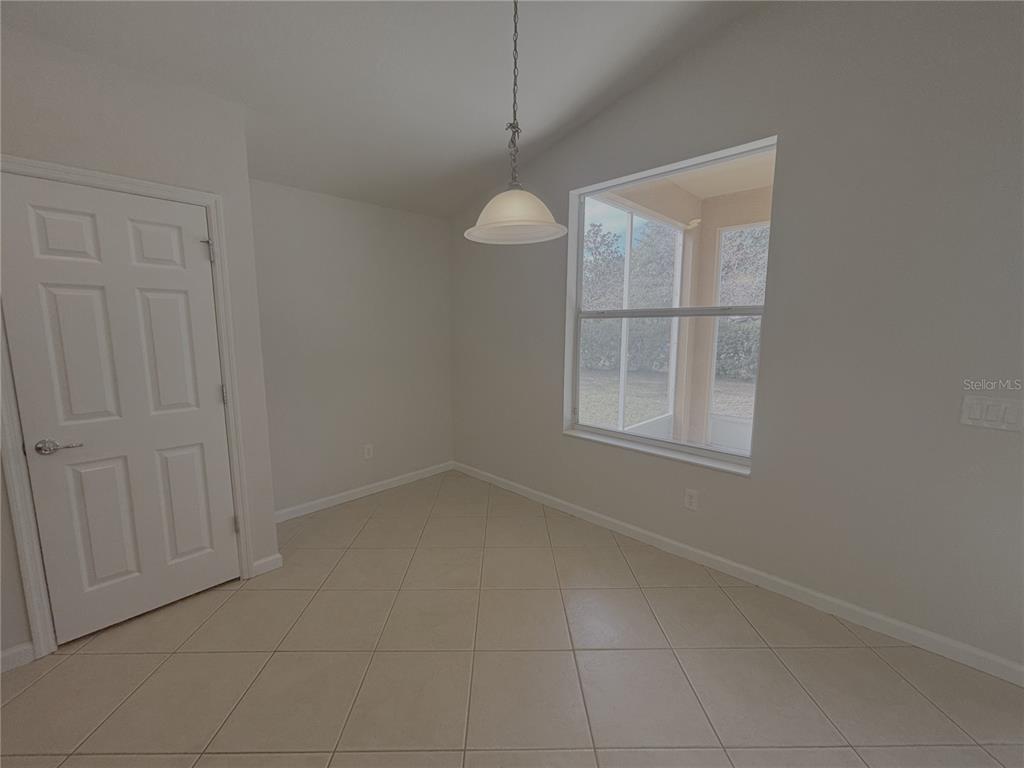 4194 Southwest 47th Court Ocala, FL 34474 - Photo 19 of 29 a room that has a window in it