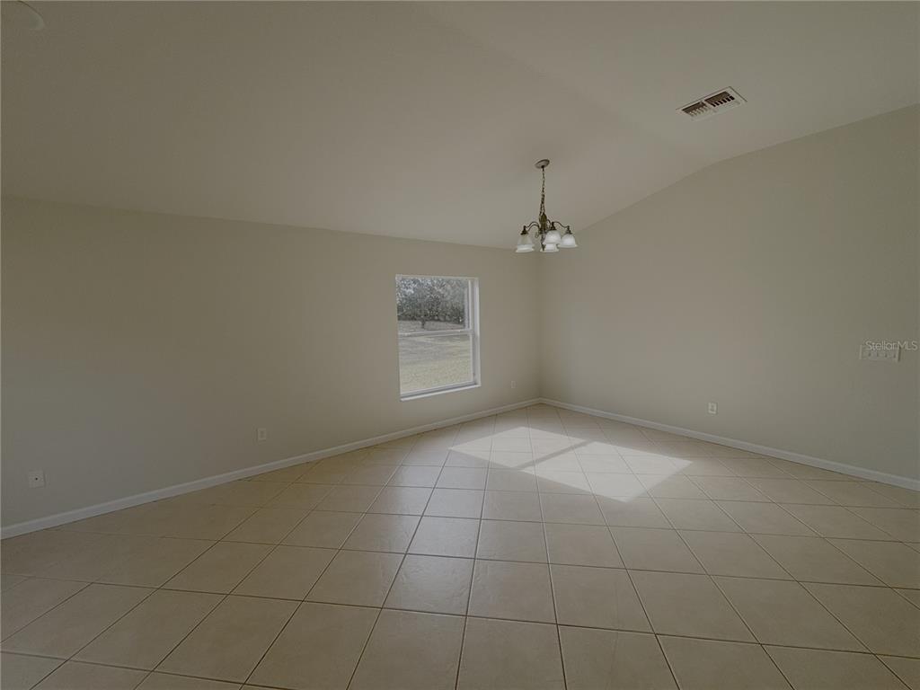 4194 Southwest 47th Court Ocala, FL 34474 - Photo 22 of 29 an empty room with a empty space