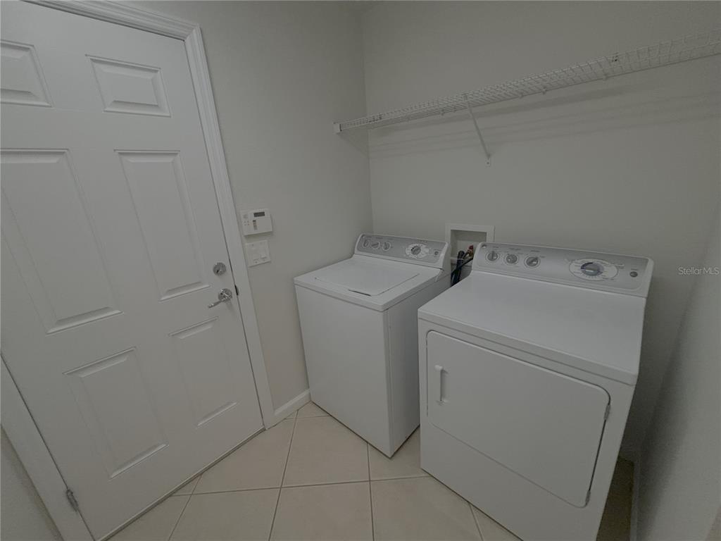4194 Southwest 47th Court Ocala, FL 34474 - Photo 23 of 29 a utility room with dryer and washer