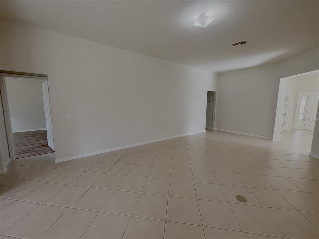 4194 Southwest 47th Court Ocala, FL 34474 - Photo 4 of 29 a view of an empty room