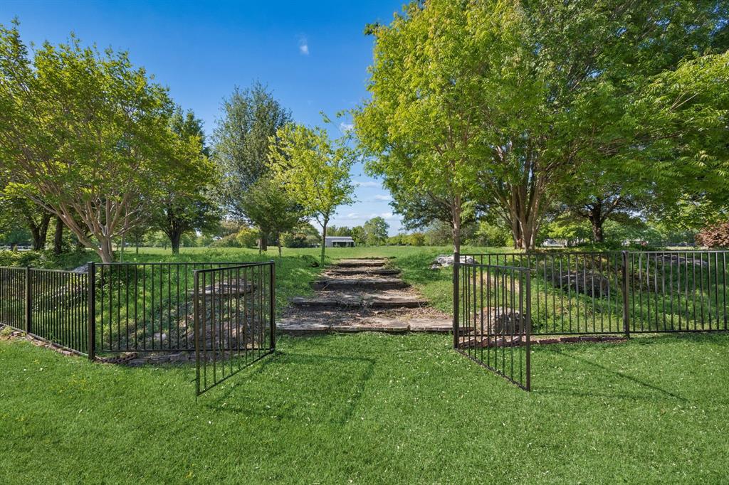 1260 Stacy Road Fairview, TX 75069 - Photo 33 of 40 Go beyond the gate to the pasture, perfect area to build a barn and raise some horses
