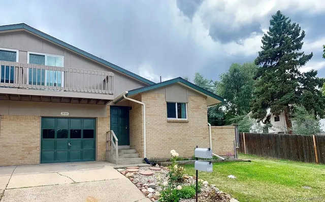 a front view of house with yard