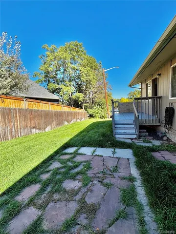 a front view of house with garden