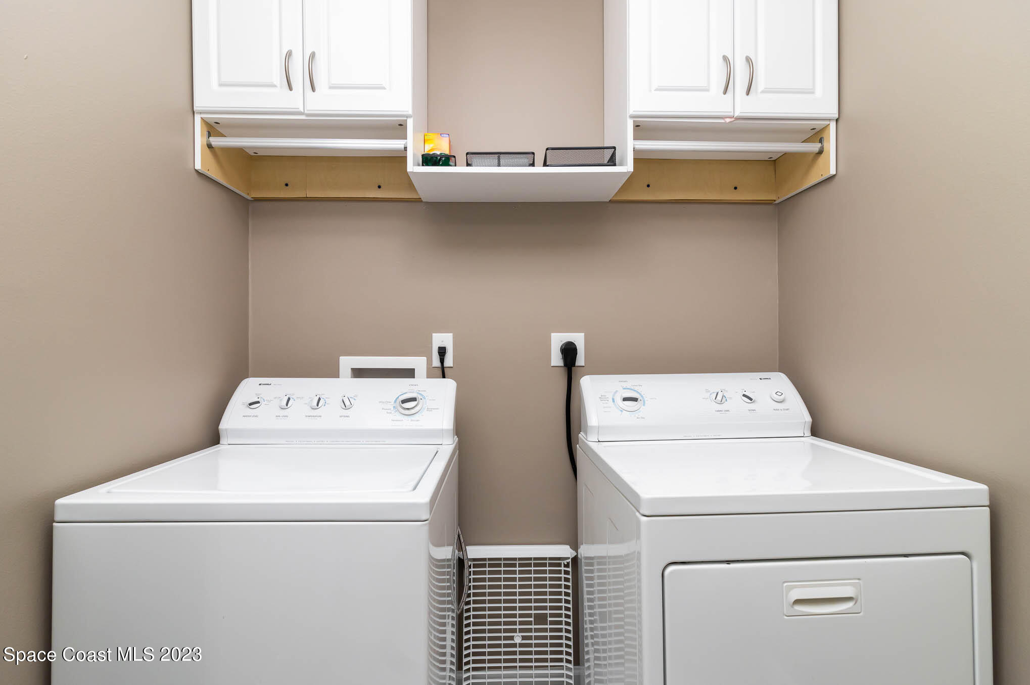 2805 Reston Street, Unit 103 Melbourne, FL 32935 - Photo 21 of 36 a utility room with dryer and washer
