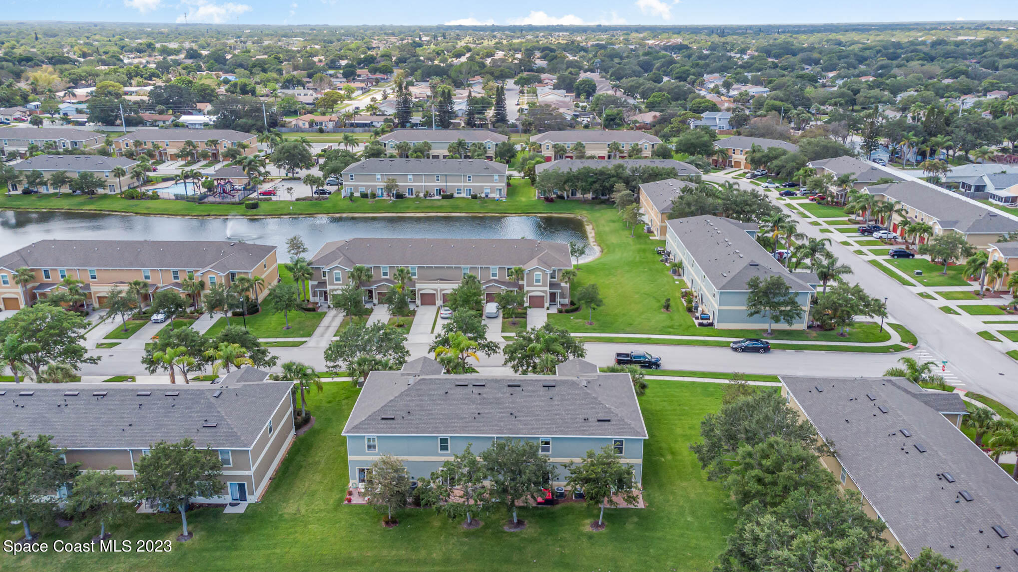 2805 Reston Street, Unit 103 Melbourne, FL 32935 - Photo 34 of 36 an aerial view of a house with outdoor space and lake view