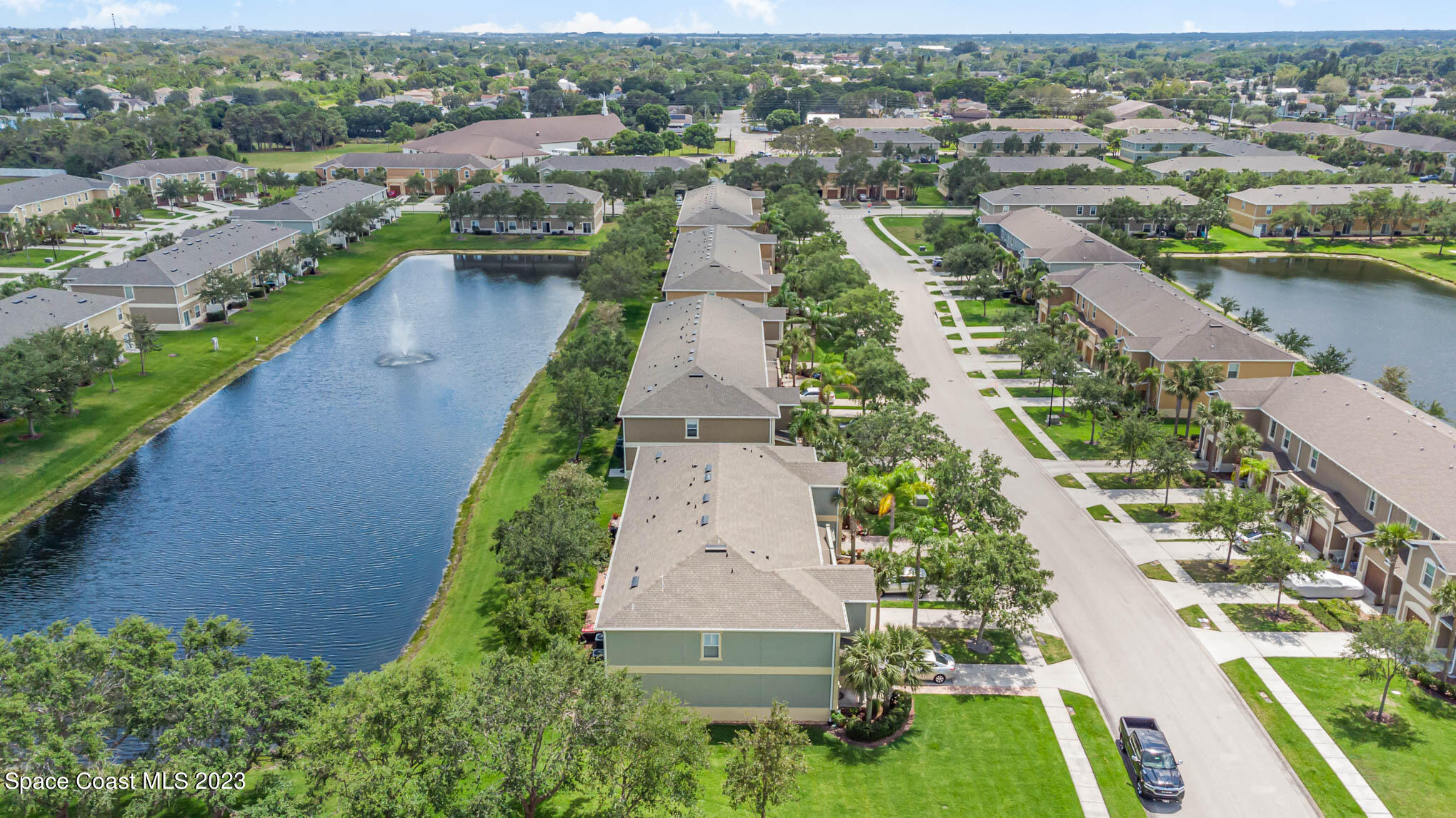 2805 Reston Street, Unit 103 Melbourne, FL 32935 - Photo 35 of 36 an aerial view of residential houses with outdoor space and river