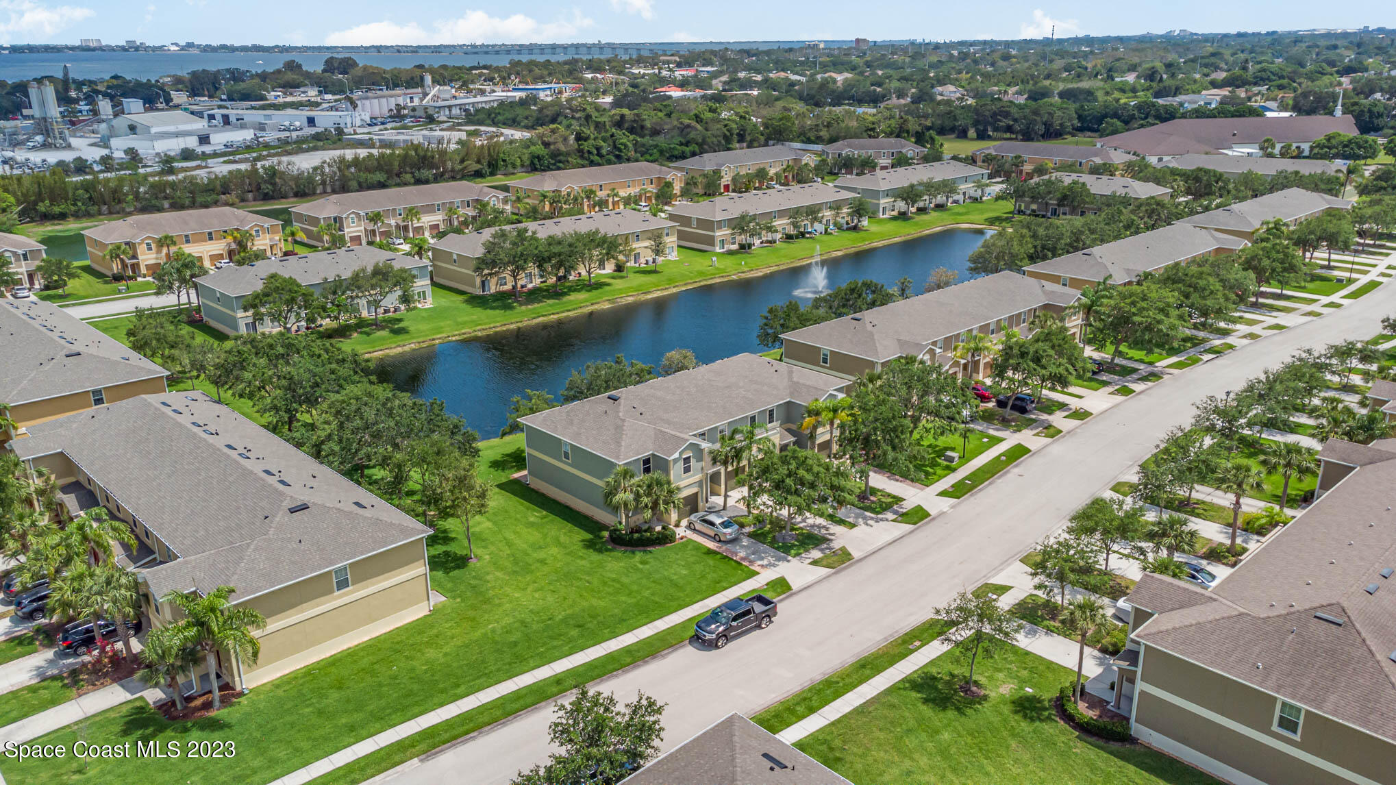 2805 Reston Street, Unit 103 Melbourne, FL 32935 - Photo 36 of 36 an aerial view of a city with lake view