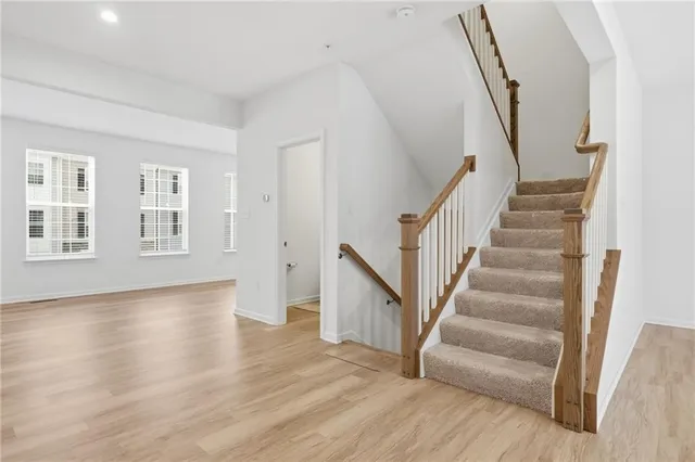 a kitchen with a refrigerator stove and sink