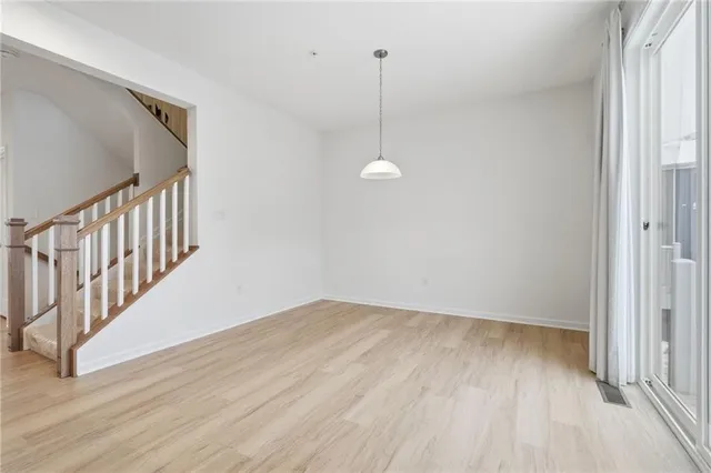 a bathroom with a sink toilet and a mirror