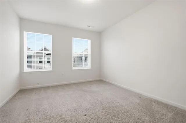 a bathroom with a sink toilet vanity and tub