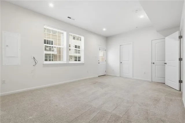 an empty room with a natural light