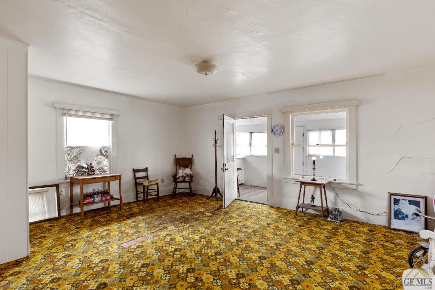 Undisclosed Address Tehachapi, CA 93561 - Photo 7 of 22 a bedroom with furniture and a wooden floor