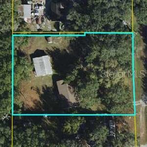 136 Commercial Street Coleman, FL 32163 - Photo 2 of 14 a view of a lake from a balcony