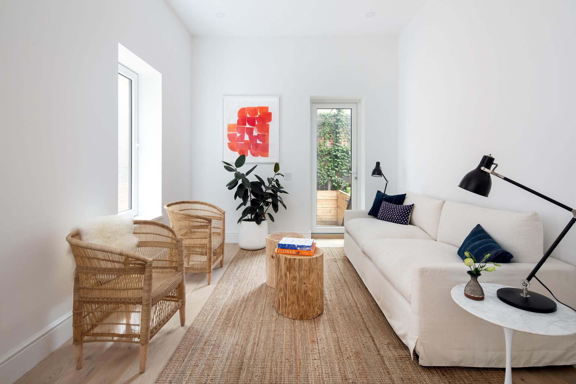 186 Clinton Avenue, Unit 2B Brooklyn, NY 11205 - Photo 1 of 1 a living room with furniture and wooden floor